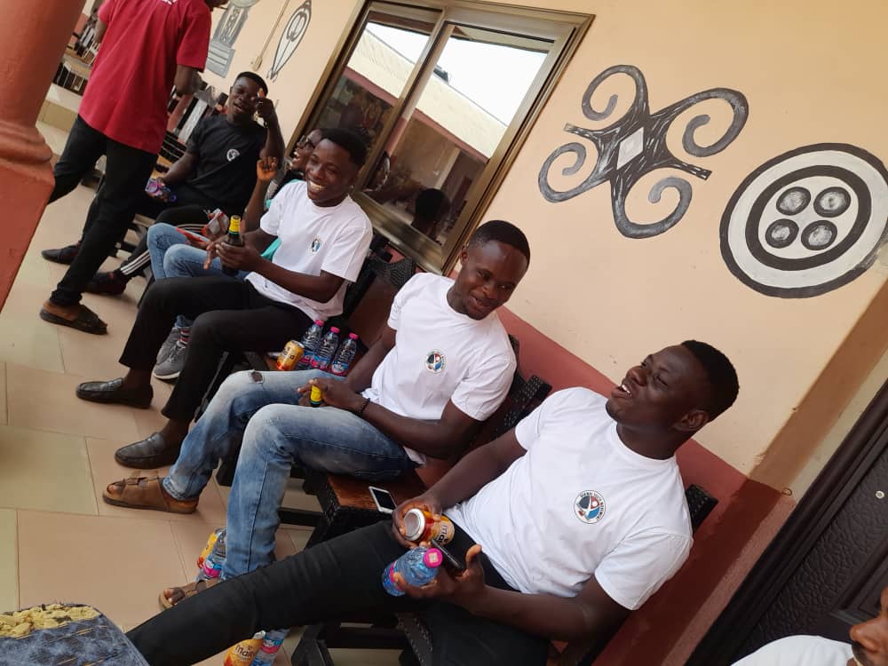 BYM volunteers sharing a light moment